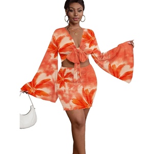 image:imageLYANER Women 2 Piece Vacation Outfits Tie Knot Front Bell Long Sleeve Crop Top and Mini Skirt Summer SetOrange Print
